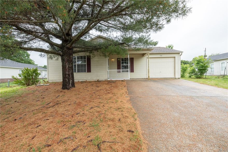 Don't miss this affordable home in Decatur. Small town charm with easy access to all Northwest Arkansas has to offer. Featuring 3 bedrooms, 2 baths, and a carport plus attached garage. Good layout, separate laundry room, and fenced-in yard. Fridge conveys! Located close to schools on a dead-end street, this property is awaiting your personal touches to call home!