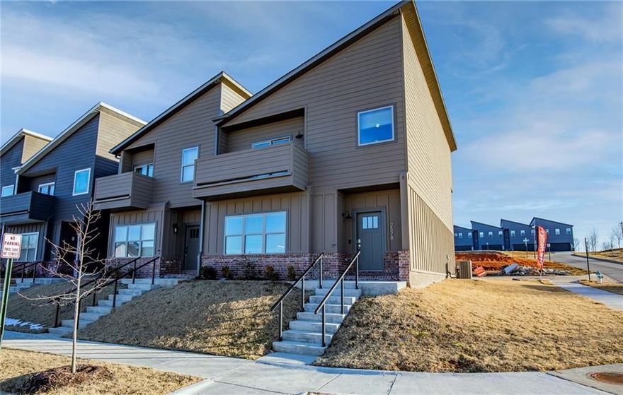 Gorgeous Fayetteville townhome! This fully furnished town home is just minutes from the interstate, the University of Arkansas, Northwest Arkansas Mall, & other Fayetteville amenities. 3 Bedroom AND an office! This home has a gorgeous view from the upper balcony, granite counter tops, open concept, plenty of natural light, large closets, & a custom interior design!