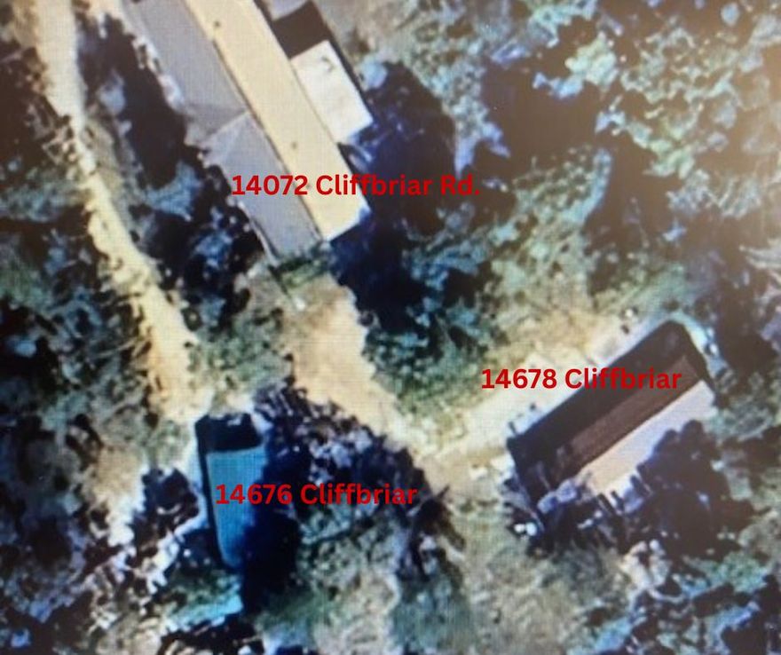 Situated on approximately 4 scenic acres just outside West Fork, this spacious 2,400 sq ft double-wide home features 4 bedrooms and 2 full baths. This property is being offered for sale in conjunction with 14676 and 14678 Cliffbriar Road, enhancing its value and versatility. These additional homes, built in 2025, offer approximately 800 sq ft and 854 sq ft respectively-ideal for rental income, guest accommodations, or multi-generational living. Whether you're seeking a private family compound or a turkey investment, this is the perfect opportunity. Current annual rental income on the two smaller homes is $33,600, with the potential to be more.  The 2,400 s.f., 4-bedroom manufactured home is on a permanent foundation.  It is currently owner-occupied.
It could also be used as a rental with a new owner. The potential income for the three properties on 4 acres is $51,600, and could be more.