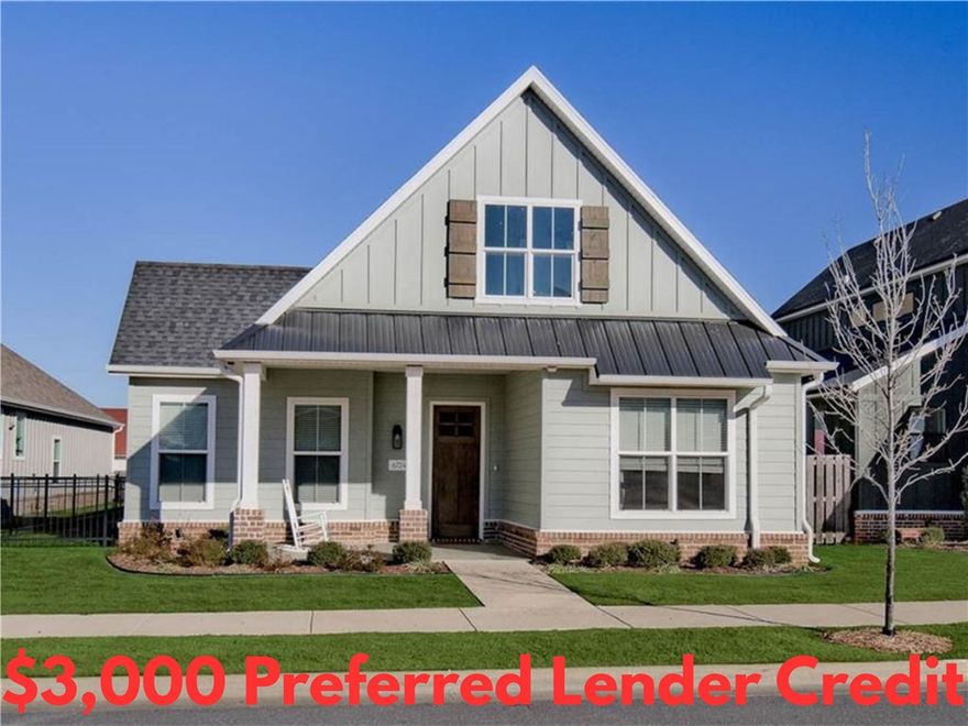 Charming home built in 2022 and located inside the highly desirable Cottages at the Park community! This adorable craftsman-style residence connects to Shaw Park which features 120 acres of beautiful grounds. As a member of the POA, you’ll benefit from lawn maintenance and access to the community pool/clubhouse. Only minutes from Shaw Elementary and provides easy access to I-49. Step inside to discover upgraded finishes throughout. Floor-to-ceiling custom cabinets in the kitchen and an oversized island are perfect for meal prep or casual dining along with an additional breakfast area. The beautiful hardwood floors add warmth and charm to the living spaces. Relax and unwind on one of the two covered porches. This home is also equipped with a sprinkler system, ensuring your landscaping remains lush and vibrant! Plus, take advantage of $3,000 in buyer’s closing costs, courtesy of the seller’s preferred lender!