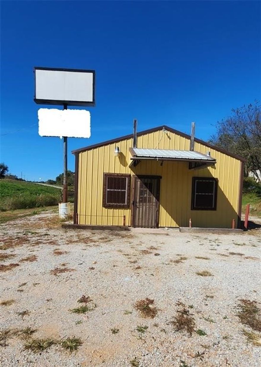 Great opportunity. A metal building, previously a bar, is now used as a church. Can be used for anything you can imagine. Sits on 1.36 acres. With 2 entrances of the major road, Hwy 62. 2-year-old HVAC system. Updated with new cabinets, paint, sinks, and light fixtures. See MLS #133206 for storage unit listings. Both can be sold together for $245,000.