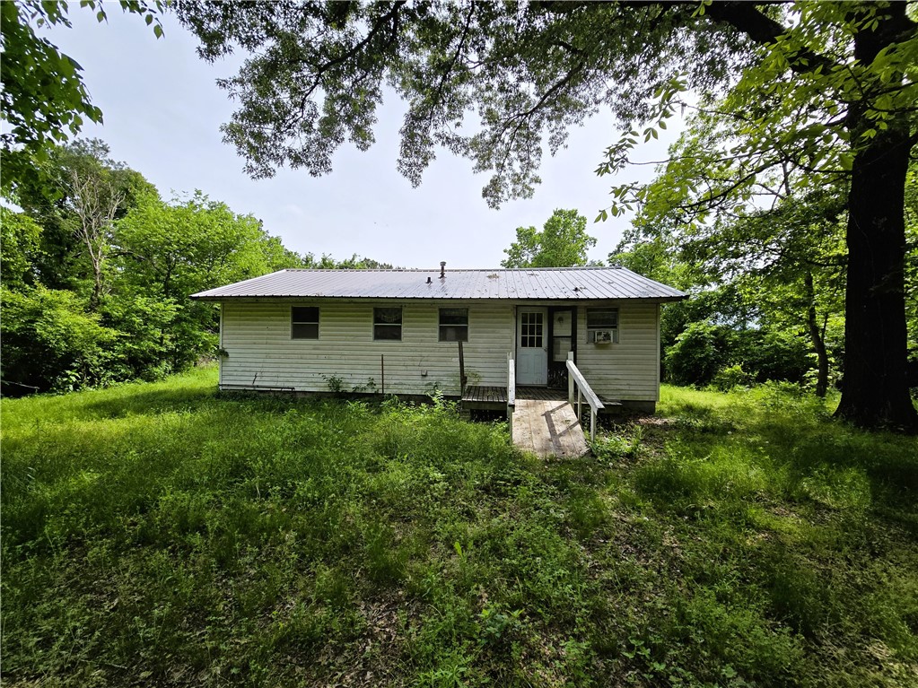 **Public Real Estate Auction to be held Thursday, August 7th at 10:00AM on site** 936 sq ft House w/t
10 acres. 2br/1ba house will need a lot of work but could make a cozy home or hunting place. 35x26 3
car detached carport. Storage shed. Nice, wooded lot w/t tons of large hardwoods. Bird watch or hunt
off your front porch, or both the choice is yours. Utilities will not be turned on for inspections. Reserve
auction, don’t let that stop you from showing up somebody will get a great buy. House is Sold As-Is
Where Is. 10% non-refundable deposit is due on the day of the auction. 10% buyer's premium. See
website for terms & conditions. All buyers are encouraged to view the property early and conduct any
inspections prior to the auction.