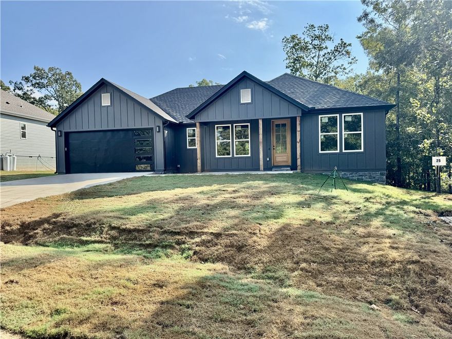 Discover the best of Bella Vista living in this stunning new-construction home, ideally located near Lake Loch Lomond, just two miles from the Branchwood Rec Center and one mile from the Scotsdale Golf Course. Designed for both comfort and style, this 3-bedroom, 2-bath home offers a bright, open layout with high-end finishes throughout. Enjoy peaceful views from the expansive covered back deck, or retreat to the luxurious owner’s suite for relaxation. The home also features a spacious laundry room, quartz countertops, custom built-ins, and a thoughtfully designed garage with ample storage. Built with strength, quality, and care, this residence blends modern elegance with lasting durability. Bella Vista offers nine golf courses, scenic lakes, over 100 miles of trails, and the state’s first mountain biking chairlift, coming soon. Whether you’re chasing outdoor adventure or simply seeking a quiet retreat, this vibrant community delivers it all. Make this exceptional home yours—schedule a showing today!