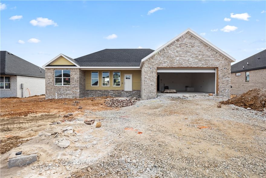 Experience the Marcus plan at Spring Creek Farms. This modern community will feature a community pool, playground and walking trails. The Marcus Plan blends modern comfort with elevated design in a single-level layout featuring three bedrooms, two baths, and a versatile office/flex space. Soaring vaulted ceilings with wood beams set the tone in the open-concept living area, centered around a stunning gas log fireplace. The gourmet kitchen impresses with granite countertops, custom soft-close cabinetry to the ceiling, a gas range with fully vented hood, built-in microwave, and a generous walk-in pantry. The primary suite feels like a private spa, complete with a walk-in shower and free-standing soaking tub. Step outside to a large covered patio—fully equipped with gas and internet hookups—perfect for effortless entertaining year-round.