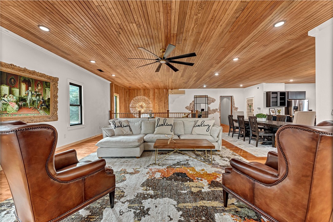 This remarkable property boasts approximately 2,600 sqft for your one of a kind, personal home. The stunning residence includes 3 bedrooms, 2 baths, large open custom kitchen & 2 living spaces, which share a fireplace. Original wood floors & ceiling sparkle in this exceptional & unique space! This conversion was done with pristine attention to detail & high-end finishes. The magnificent sanctuary, with stage, choir balcony, Bride rooms & Baptism tub is ready for your congregation, weddings, or just about anything you can think of doing with this lovely & adorned space. The large & spacious fellowship hall includes, 5 bathrooms & a kitchen. So many large rooms, with an incredible range of uses. Spacious basement is there for you to create your own space; office, gym, or media room, or all of these! Professional pictures coming soon!