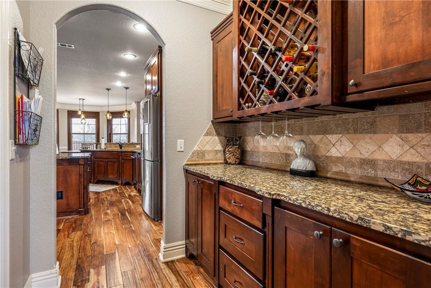 Located in the highly sought-after Chapel Hill subdivision, this beautifully updated 4 bedroom, 4 bathroom home offers 3,488 square feet of move-in-ready living on a  cul-de-sac in Bentonville. Recent upgrades include new flooring throughout, upgraded garage doors, epoxy-coated garage floors, and a refreshed kitchen featuring a new range, microwave, dishwasher, pot filler, kitchen faucet, and updated pendant lighting. Major system improvements include a new HVAC system and a new roof and gutters (2024).
The functional floor plan includes a guest bedroom with ensuite bath, ideal for visitors or flexible living arrangements. Enjoy outdoor living on the covered patio with fire pit, perfect for relaxing or entertaining.  Chapel Hill remains one of Bentonville’s most popular neighborhoods due to its prime location near Walmart Home Office, Crystal Bridges Museum of American Art, the Alice L. Walton School of Medicine, extensive bike trails, and just 10 minutes to Downtown Bentonville.