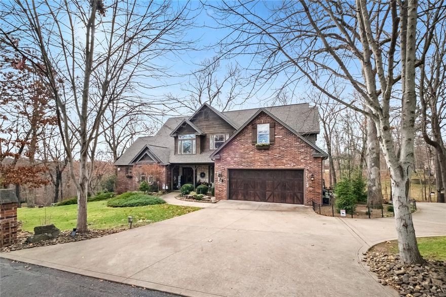 Stunning 5BR, 6BA home on a private 1.52-acre wooded lot in Stone Ridge Estates! Over 5,400 sq ft across 3 levels, featuring a gourmet kitchen, wine cellar, storm shelter, and 4-car oversized garage with workshop. Enjoy 4 living areas, including a screened porch with a gas fireplace, plus a grand entry with cathedral ceilings. Energy-efficient with a new roof (2020), AC (2018), and 2 hot water heaters (2018). Hardwood floors, custom finishes, and a flexible floor plan make this home a true gem!