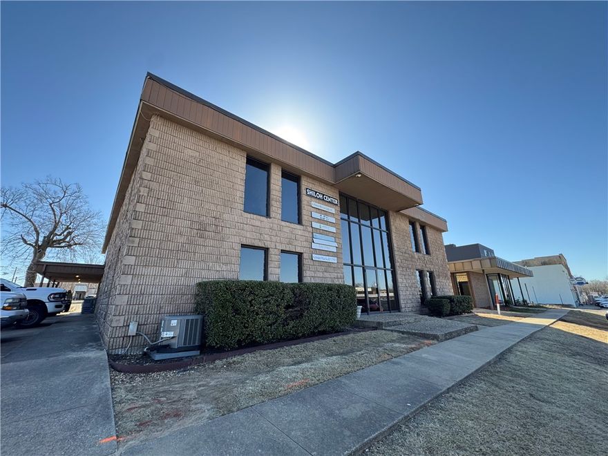 Well established professional office building in the heart of downtown Springdale. Convenient to City Hall and overlooks Walter Turnbow Park and Greenway Bike Trail. Building offers common area, restrooms, and 2 story atrium/lobby, and plenty of parking. Gross Lease, with monthly rent of $600. Includes utilities, taxes, insurance, CAM, and janitorial. Tenant pays phone/internet. This suite contains 400 sqft of office space.