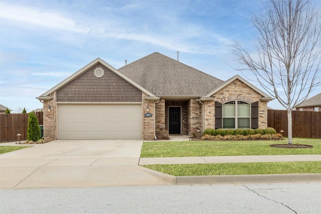 Come see this beautiful 3-bedroom, 2-bath home in the desirable Cobblestone neighborhoodāmove-in ready and packed with features youāll love! From the moment you enter, youāll be welcomed by a warm and inviting living room with elegant touches like crown molding, engineered hardwood floors, and a gas log fireplace that serves as the perfect centerpiece. The spacious kitchen offers an abundance of sleek granite counter space, stainless steel appliances, bar seating, an eat-in area, and a large pantry for added convenience. The primary suite features dual vanities with a make-up counter, a jetted tub, and a walk-in closet. Plus, all bedrooms have brand-new carpet! And just wait until you step out backāthis partially covered patio is ready for entertaining, complete with a built-in grill and incredible privacy landscaping. You'll never need to leave home to cheer on your favorite team again! All this just 10 minutes from the University of Arkansas and shoppingāthis one is a must-see!