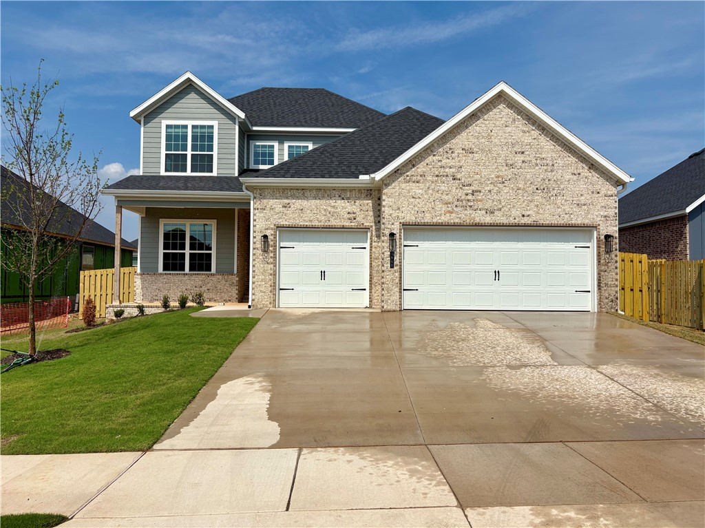 Pea Ridge is an up-and-coming community in Northwest Arkansas, Yorktown offers the perfect opportunity to find your dream home. This affordable, scenic, and well-maintained area caters to a variety of lifestyles, making it an ideal place to live. Upon entering the Willow Plan, you're welcomed by a charming front porch. Inside, an office space with wood accent walls greets you, LVP leads you into the open-concept living, kitchen, and dining area. The kitchen is equipped with 3CM granite countertops, custom cabinets, and a beautifully crafted wood hood. Conveniently located off the garage are cubbies, the utility room, and a powder room. The primary bedroom features exposed beams and an ensuite bathroom. Upstairs, you'll find three additional bedrooms, each with spacious walk-in closets.The covered back patio, perfect for relaxing or entertaining.For a limited time rates starting at 4.99% OR $7,500 from builder & up to $4K from preferred lender.
