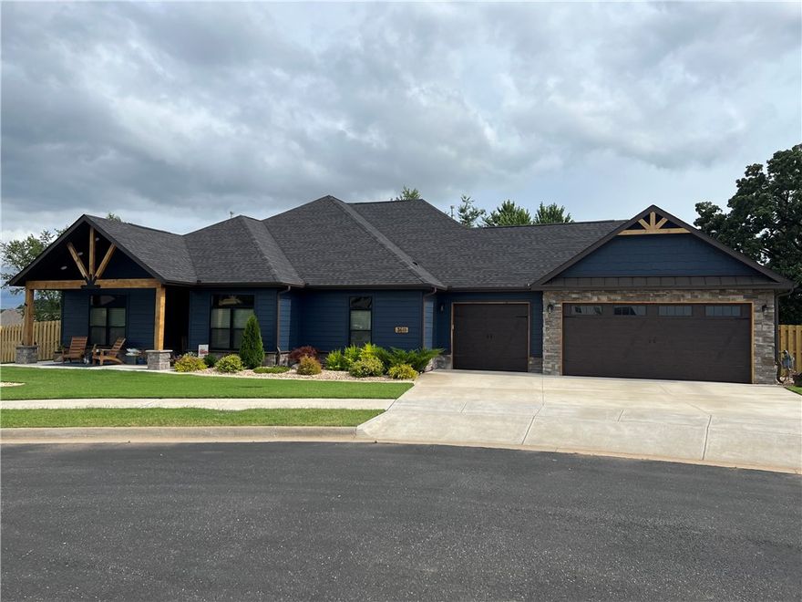 This is one of those must see homes! Every bell and whistle your heart desires.  Located on oversized cul-de-sac lot in Big Sky Subdivision, just 2 miles to I-49, it's rural living w/ an easy commute.  Beautiful landscaping w/ lighting (switched outlets for holiday lights) - vaulted beamed ceiling in living. Engineered hardwoods thru-out w/ tile in baths & laundry. Granite. High end Jenn Air appliances. wine refrigerator. Primary suite - love the inset wood ceiling, soaking tub, walk-about shower., even a bidet seat. Private door to the heated, salt water splash pool.  All 4 bedrooms could accommodate a king bed, if needed. Large walk-in closets. Loads of customization in baths, laundry, kitchen, office. Office has dual work stations, drawers and built-in shelving, and a 14ft slice of pecan wood for the countertop.  Gotta see that! Oversized laundry with shelves, cabinet, & a great little sink to wash your smaller pet.  The covered back patio has a built-in TV, firepit with gas, and plumbed for an outdoor kitchen.