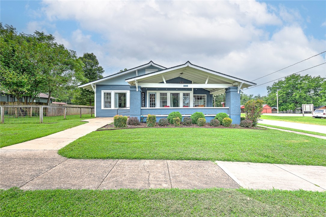 WELCOME TO THE HUB! A charming dual-purpose property zoned for Residential and Office. This beautifully appointed 3-bedroom, 2-bathroom gem is located directly across the street from the public library. Bursting with character, this unique property blends lifestyle and investment with ease. The home is currently utilized for personal use as well as providing income as a popular Airbnb. The home offers flexibility for homeowners, investors, or entrepreneurs alike. The kitchen is a true standout, featuring high-end CafĆ© Series appliances (which all convey), rich wood and granite countertops, and an expansive butlerās pantryāperfect for cooking, entertaining, or catering operations. Whether youāre looking to settle in, generate passive income, or establish a boutique office, this versatile property is a rare opportunity in a prime location!