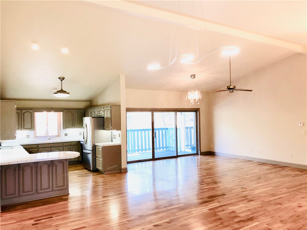 Contemporary 3 bedroom, 3 bath home located on wooded 2 acres, just minutes from downtown Eureka Springs! The Beautifully landscaped yard, stonework & outdoor lighting showcase the curb appeal. The extensively renovated interior boast an open living/dining area, hardwood floors, modern light fixtures, a master suite w/heated marble floors, large walk-in marble shower, oversized jetted tub & a custom built walk-in closet w/tons of built in storage.