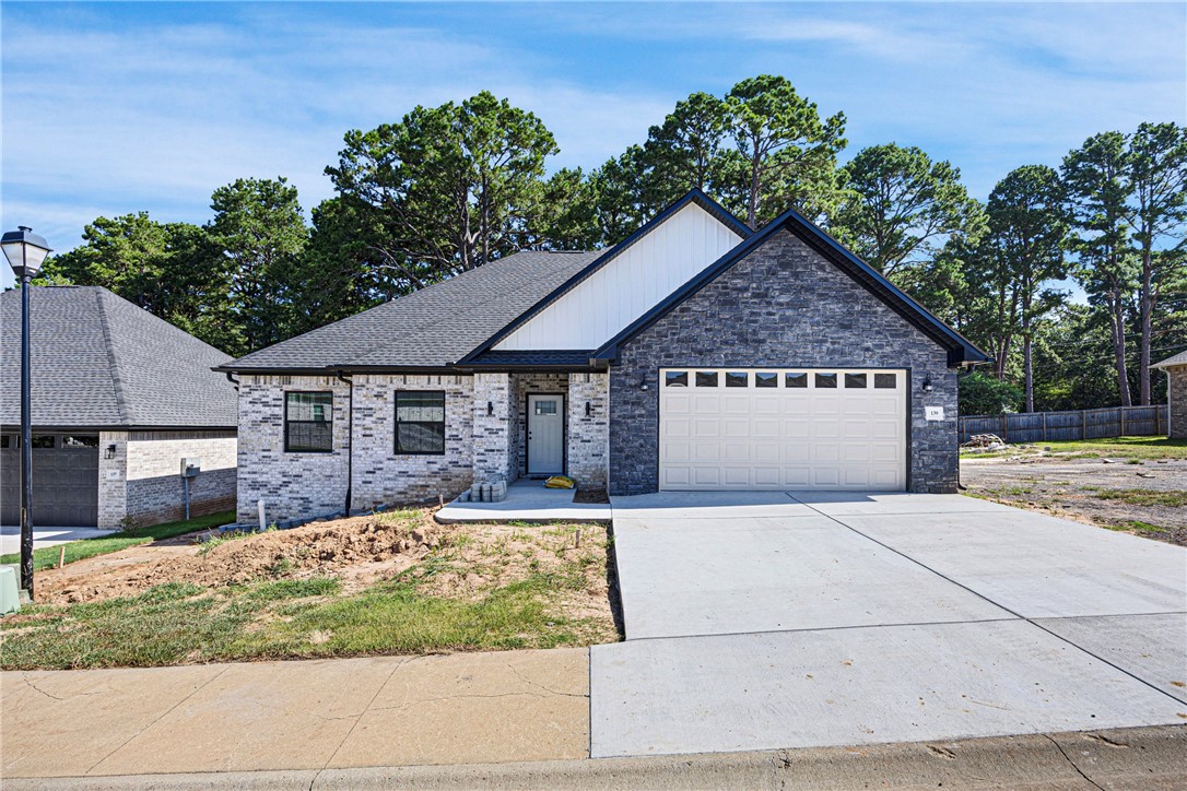 Discover this stunning new construction in a gated Planned Unit Development offering private lake access and a true sense of community living. Featuring 3 bedrooms, 2 baths, and an open-concept design, this home is perfect for modern lifestyles. The stylish kitchen flows seamlessly into the living and dining areas, leading out to a peaceful back deck—ideal for relaxing or entertaining. Nestled in a desirable area known for its beauty, safety, and thoughtful planning, this home offers comfort, connection, and convenience all in one.