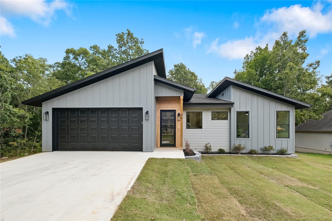 Who is ready for a LUXURY MODERN? Cost was not spared in this one at all! Custom white oak cabinets throughout the kitchen, bathroom vanities, and laundry room. Highest level quartz throughout the island with double sided waterfalls, countertops, backsplash, bathroom vanities, and laundry room. Large luxury picture windows everywhere including a 20ft back wall of glass. Custom white oak accent strips on 20ft tall fireplace and bathroom vanity walls. Large custom 8ft tall solid core doors throughout with luxury glass 8ft tall front and back doors. High End finishes and quality everywhere you look, all on a flat lot and just a 45 second bike ride to Lago Vista Spur bike trail and Lake Avalon Beech. Its a MUST SEE!!!