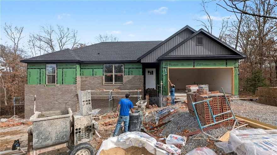 Welcome To Your Next Home! This New Build Puts You Right In The Lake Loch Lomond Area With Tiree Park Around The Corner And Quick Access Back To The Bypass. Step Inside To A Bright, Open Layout With 9 Ft Ceilings, A Comfortable Living Area, And A Corner Fireplace That Anchors The Space. The Kitchen Delivers Everyday Function With Custom Cabinets, Granite Counters, Tile Backsplash, Under-Cab Lighting, Pantry Storage, Island Seating, And A Dining Area Filled With Natural Light. The Primary Suite Offers A Walk-In Closet, Soaker Tub, Tile Shower, And Dual Vanity For Easy Daily Routines. Two Secondary Bedrooms Provide Flexible Space For Guests, Office Needs, Or Hobbies, Along With A Full Hall Bath Featuring A Double Vanity. Out Back, A Covered Deck Overlooks A Fresh, Sodded Yard Ready For Relaxing Or Weekend Grilling. Construction Is Progressing For A Jan/Feb Finish, And There’s Still Time To Make Interior Selections To Match Your Style. Come Check It Out! **Finished pics as example of different build, same plan.