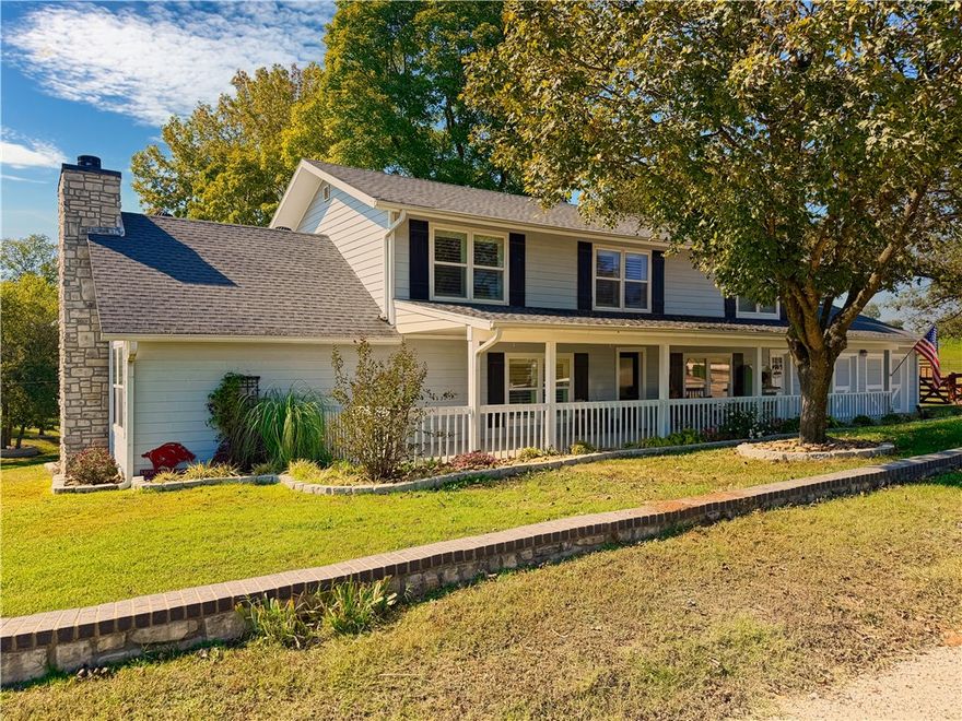 Updated 4BR/3BA authentic farmhouse on 5.04 acres in prime West Springdale! This 2,672 SF home blends modern comfort with timeless charm and is perfectly set up for a hobby farm or horse property. Features include a 1,488 SF shop with 3 bay doors and a heated/cooled office or man cave, plus a barn with loft, 1 powered bay door, tack room, and horse stalls. Property is fenced and cross-fenced with a 3-rail wooden horse pasture. Located off Old Hwy 68 on a quiet county road—just minutes from town. The new 612 Bypass (opening soon) will provide access in under 5 minutes. A rare opportunity to enjoy land, lifestyle, and location in one incredible property! Additional Acreage Available. AGENT OWNED.