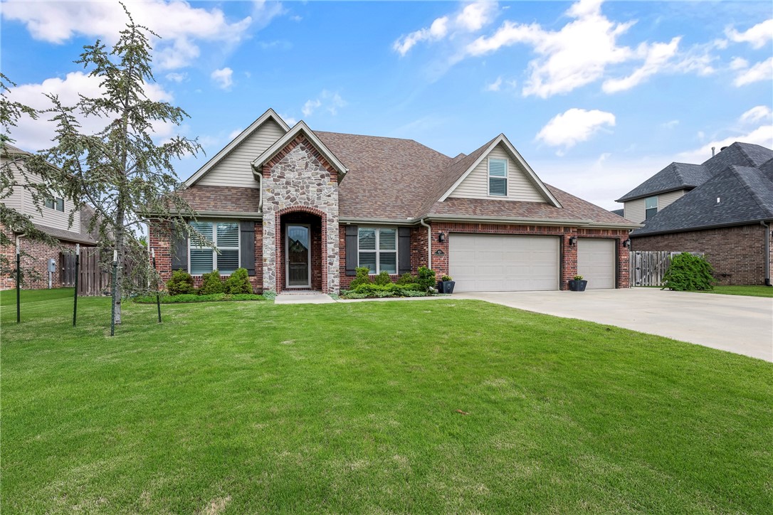 This beautifully maintained and exquisitely decorated home has so much to offer. With 5 bedrooms, 3 full bathrooms, and a bonus room, there is ample space for families to thrive and guests to feel welcomed. Upon entering, you are greeted by a spacious and inviting living area, ideal for gatherings and relaxation. The well-appointed kitchen features sleek granite countertops, modern appliances, and ample storage, making meal preparation a joy. The primary suite is a sanctuary of its own, offering tranquility and privacy. The en-suite bathroom is a luxurious retreat with a soaking tub and tile shower. Outside, the property offers a beautifully landscaped yard, and covered back porch, perfect for outdoor entertaining or simply enjoying the serene surroundings. Gardeners will love the raised garden beds and greenhouse. The attention to detail in this house is impressive and makes this a must see!