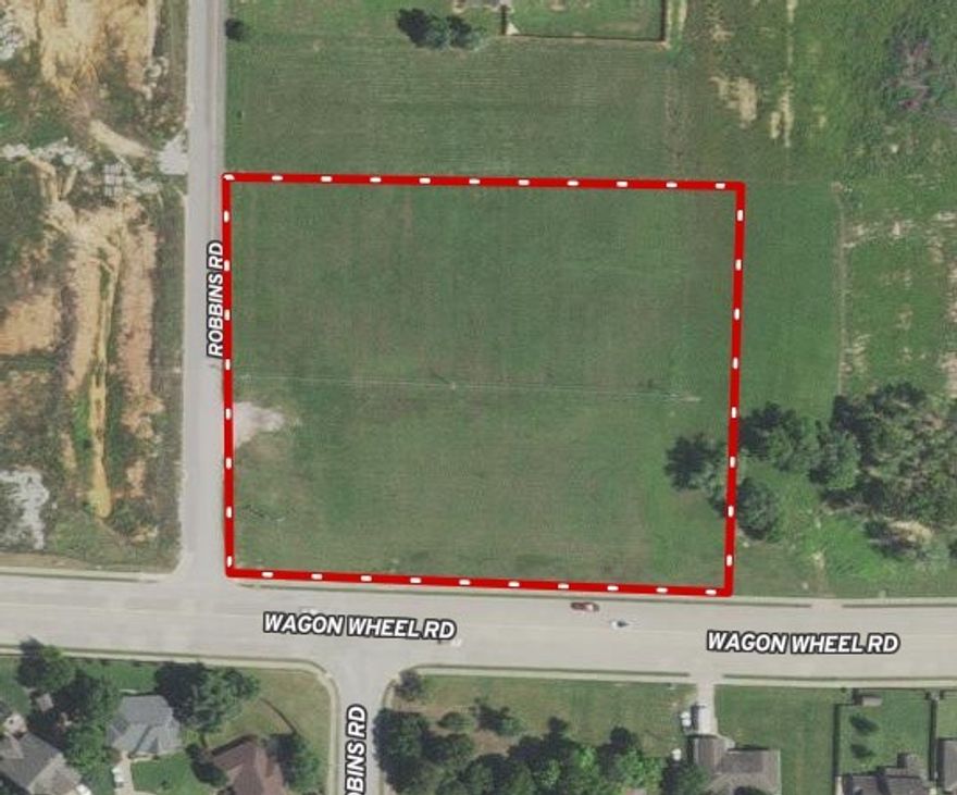3.66 acres currently zoned C-2 with approximately 450' of Wagon Wheel frontage (see Tract 1 on attached survey). Robins Road is the west boundary for additional access. Close proximity to I-49. Water is on south side of Wagon Wheel.  Sewer is available in northeast corner of property.  No detention needed on subject property.  New survey on file.