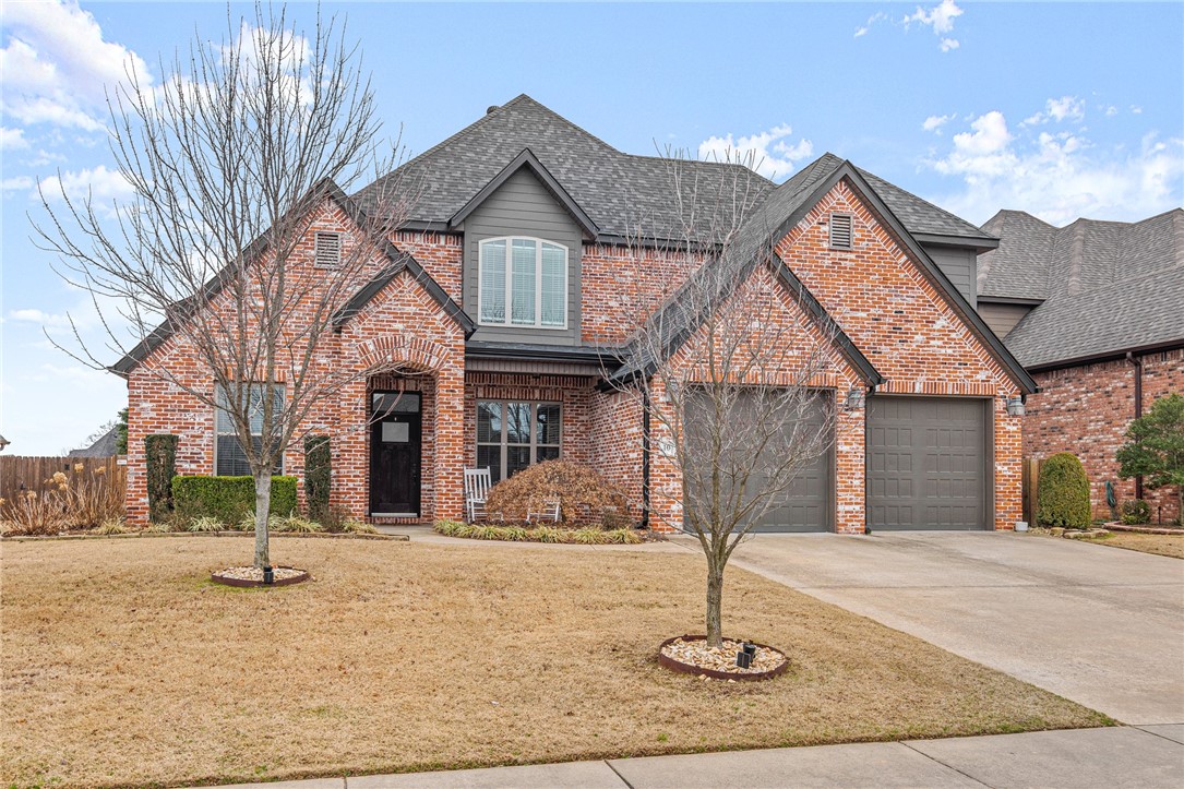 Located in the highly desirable Woods Creek neighborhood and just 2.5 miles from the new Walmart HQ, this stunning 5-bed/3-bath home offers a fantastic open floor plan designed for entertaining. The main level features a spacious eat-in kitchen with a 6-burner gas cooktop, large island, and pantry, along with a formal dining room, large living room w/ a cozy brick fireplace and built-in bar, a primary suite with a walk-in closet, two add'l bedrooms (one perfect for an office), and a full bath. Upstairs, you’ll find a bonus room with a rock climbing wall and kitchenette, 2 more bedrooms, & a full bath. The 3rd car tandem garage provides ample space for a workshop, storage, or even a boat trailer. Enjoy the community amenities, including a pool, playground, basketball courts, pavilion, trails, & a pond. Add'll features include a new roof, central vac, sprinkler system, professional landscaping with a gorgeous Japanese maple, a trampoline, & a play set. Close to trails and DWTN Bentonville, this home is a must-see!