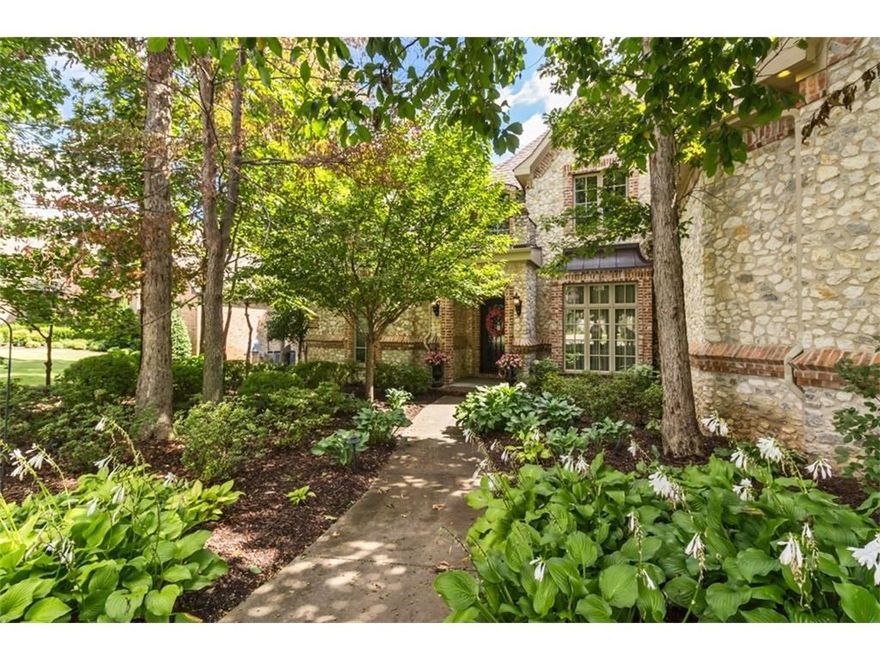 Gorgeous custom home on golf course, viewing hole # 12. This 5,330 SQ FT 4 bedroom, 4 bath residence on tree canopied lot offers first class amenities such as gourmet kitchen, elegant master suite & bath, executive style library, craft room and media room. Stunning view's from outdoor living area complete with fireplace & outdoor grill makes this a one of a kind home.