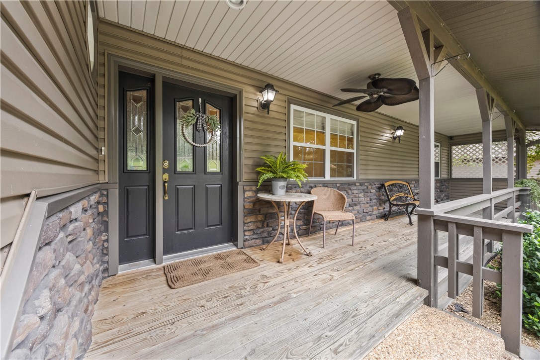 Experience lakeside living on Lake Brittany in this perfectly maintained home with a 10x20 dock and two covered decks overlooking the water. The main floor offers a welcoming layout with two bedrooms, an office, and 2.5 baths, highlighted by quartz counters and updated tile. The lower level includes a second family room, bedroom, and bath, along with a versatile heated/cooled workshop. Surrounded by tiered landscaping, natural stone accents, and a lake-fed irrigation system, this home blends comfort with natural beauty. Approved borrowers will receive a closing cost credit of 1% of the loan amount up to $5,000 on their Closing Disclosure on their loan closing with Envoy Mortgage Branch NMLS #2659248 and Branch NMLS #2579798.