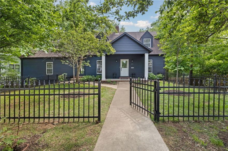 You must see this thoughtfully restored 1949 Fayetteville home zoned for Root Elementary, Holt Middle, and Woodland Jr. High.  A full renovation to this 4-bed, 3-bath home with 4 additional flex rooms includes new HVAC systems, new lighting with LED cans and designer fixtures, all new paint, original white oak floors and new oak added and finished by Wood Floor Gallery. Original windows and brass hardware were lovingly restored, with new vinyl windows and Emtek hardware added as needed. The kitchen received new custom cabinetry, quartz countertops, CLE tile backsplash, a Wolf range with stainless vent hood, and Bosch refrigerator, dishwasher, and microwave. Wallpaper accents add an age-appropriate warmth and character to the large dining room. Renovated baths received new tile, vanities, lighting, plumbing fixtures, and countertops. The front and back yards have been newly fenced-in. Updated landscaping beds include a new professional irrigation system. Native persimmon and pear trees are found on the property.