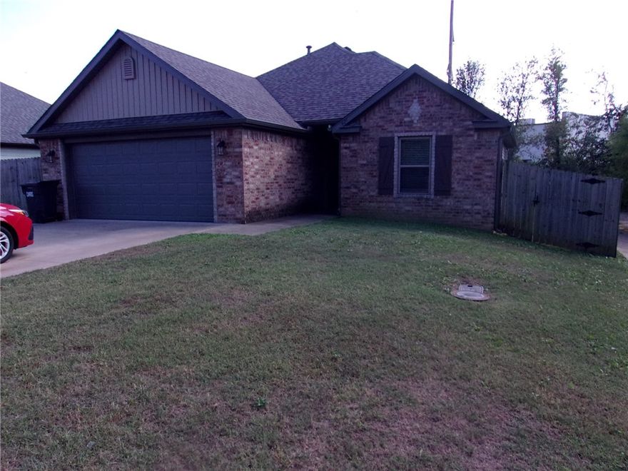 Located next to the elementary school and offering direct access to the Razorback Greenway Trail at the end of the road, this well-maintained home combines comfort, convenience, and modern updates.
Step inside to find new carpet, a new roof, and new siding on the west side of the home. The kitchen features beautiful granite countertops, an eat-in dining area, and new stainless-steel appliances including a new dishwasher and microwave with vent. The living room showcases durable vinyl plank flooring that flows seamlessly into the kitchen and laundry areas. The primary suite offers a walk-in closet and a double-sink vanity with granite countertops. Both bathrooms also feature granite surfaces, adding a touch of elegance throughout. Additional highlights include crown molding throughout and a separate pantry room in the utility area. Enjoy being within walking distance of the school and just steps away from outdoor recreation on the Greenway — the perfect combination of location and lifestyle!