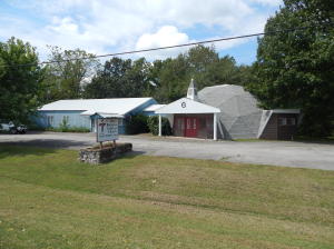 Church building for sale, approx. 4,641 sq.ft total, sanctuary, fellowship hall, office, kitchen, two other rooms, central heat and air, beautiful woodwork in sanctuary, fenced playground, outside storage building, paved parking in front on 1 acre Hwy 221 North frontage. Water well but city water is across the road. all electric but 2 propane heaters in sanctuary for additional heating.