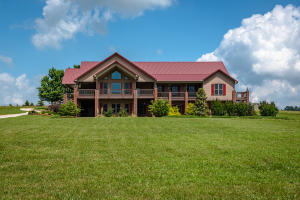 Charm and sunshine await you in this 5 bedroom, 3 bath home. The view of Gaither Mountain will take your breath away! This is a perfect home for entertaining family and friends!Plenty of room with wrap around porches on main level and basement level. Also has a shop with pull-through high garage doors for RV, workshop area, full bath, washer/dryer connections, kitchen with stove and refrigerator. This is a must see to truly appreciate all this property has to offer.