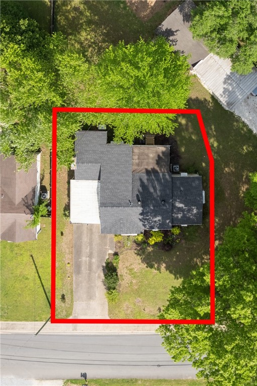 South Fayetteville fixer-upper opportunity. Offered with approximately .13 acres subject to lot split approval, this property retains classic details with hardwood floors, a wood-burning fireplace, and newer windows throughout. Recent updates include HVAC with ductwork (2024), hot water heater (2023), roof (2019), dishwasher (2025), and gas range (2022). A screened-in porch overlooks the landscaped yard, creating outdoor appeal. Sold as-is, this home is move-in ready with plenty of room for updates. Conveniently located near the University of Arkansas, only 1/2 mile from a university bus stop. Within walking distance of South Yard, Baum Stadium, local breweries/restaurants, and the new U of A art building, it’s a strong candidate for investors or homeowners. //Also listed as .44 acre with MLS # 1323604 and and .31 acre lot with MLS # 1323606