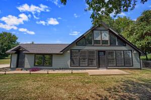 This home is a must see! If you've been looking for a place to call home, look no more. 3 bedroom, 2 bathroom home located less than 10 minutes of downtown Russellville, Arkansas. Just a short drive to Lake Dardanelle and the Ozark Mountains to enjoy fishing, hiking, camping and more. This home offers 2,210 square feet of living space, including a sensible kitchen, bright living room and an upstairs bedroom/bathroom. Two living spaces are included to give you room to entertain, along with a fenced in back yard. All situated in a quiet neighborhood, just minutes from Old Post Park and the Russellville Soccer Complex. This home is priced to sell, so don't let it pass you up. Set up a showing today!