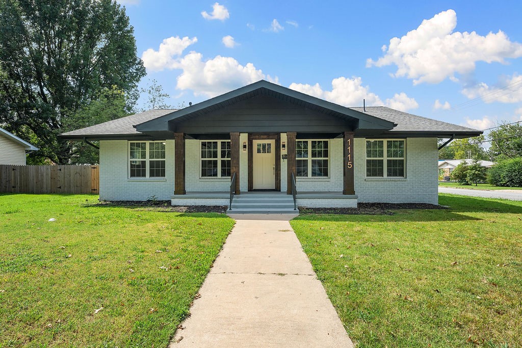 Beautifully remodeled home in Springdale located in the ideal location to all the local amenities but also providing all the finishings of a new home! This one level, 3-bed, 2.5-bath with an office/bonus room offers the ideal floor plan. Inside, the open concept living space flows perfectly for entertaining & everyday living. The kitchen features granite countertops, an island, a walk in pantry (8' deep!), stainless steel appliances & eat in kitchen. The primary suite is perfectly tucked away with the primary bathroom including a jetted tub, double vanity, walk-in tile shower, two walk-in closets. Relax on the spacious back deck with easy access from either the kitchen or the primary bedroom. Notice the detached building, ideal for a shop or storage. Property sits on a cornered lot with gated off-street parking with 2 entrances. Located just 2 minutes from Murphy park & the aquatic center, 2 minutes from Springdale High, 4 minutes from Shiloh Christian, 5 minutes from Downtown Springdale, & 10 minutes from I49.