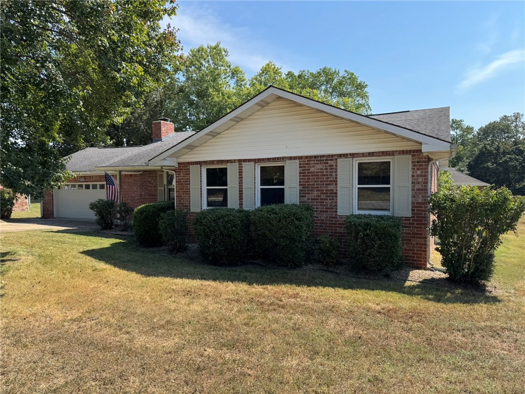 WELCOME TO THIS MOVE IN READY 3 BEDROOM/2 BATH BRICK HOME LOCATED IN A QUIET SUBDIVISION, CLOSE TO SCHOOLS, SHOPPING, AND LOCAL AMENITIES. THE HOME SITS ON A LEVEL LOT THAT FEATURES A LARGE SHADE TREE. INSIDE THE HOME FEATURES A WELL-DESIGNED KITCHEN, LIVING ROOM WITH A WOOD BURNING FIREPLACE, & PLENTY OF CLOSET SPACE. ALL APPLIANCES & THE HOT TUB WILL CONVEY WITH THE SALE.