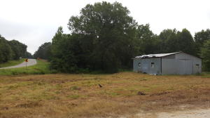 This 3.70 Acres is just off a paved road, with all utilities on the property! Also includes a shop, shop needs some TLC! However this would be agreat place to build a new home! Property also already has a storm shelter on the property as well. Call today, before its gon