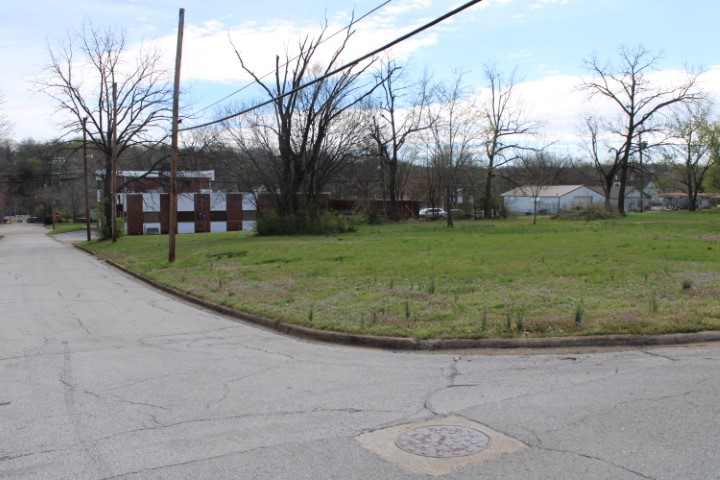 Only 1/2 block form the new Harrison Community Center!! 3 level lots with some visability form the community center and Hwy 7 SOuth. Take Advantage of the increasing traffice flow on Hwy 7 S (Pine St) as the community center is open plus the re-development of the former Dogpatch USA property by Johnny Morris finalizes only 10 miles out 7 South... and Jwy 7 is the major route to the Buffalo National River Parkland, Jasper, and all the attractions of Newton County. Property is currently zoned R-3 and adjoins C-3 across back, all city utilities including water, sewer, natural gas available... buyer should verify utilities and zoning. A "Can't Miss Location" for your business, apartments, or other investment opportunities... Contact us Today!!