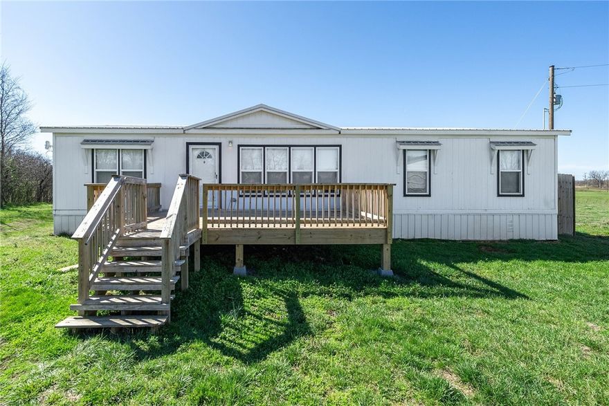 Escape to the peace and privacy of country living with this secluded property offering both comfort and functionality. Major updates include a new septic system installed in 2022 and a high-efficiency HVAC unit for improved energy savings and comfort.
A standout feature of the property is the 24x50 shop, built with durable 29-gauge metal, sitting on a 4” thick 4000 PSI concrete slab and equipped with three 8x9 roll-up doors—perfect for equipment, storage, hobbies, or a home business.
The property also features a 9.6 kW solar system that will be fully paid off at closing, providing energy efficiency and long-term savings for the new owner.
If you’re looking for space, privacy, and a property that’s ready for work and play, this one checks all the boxes.