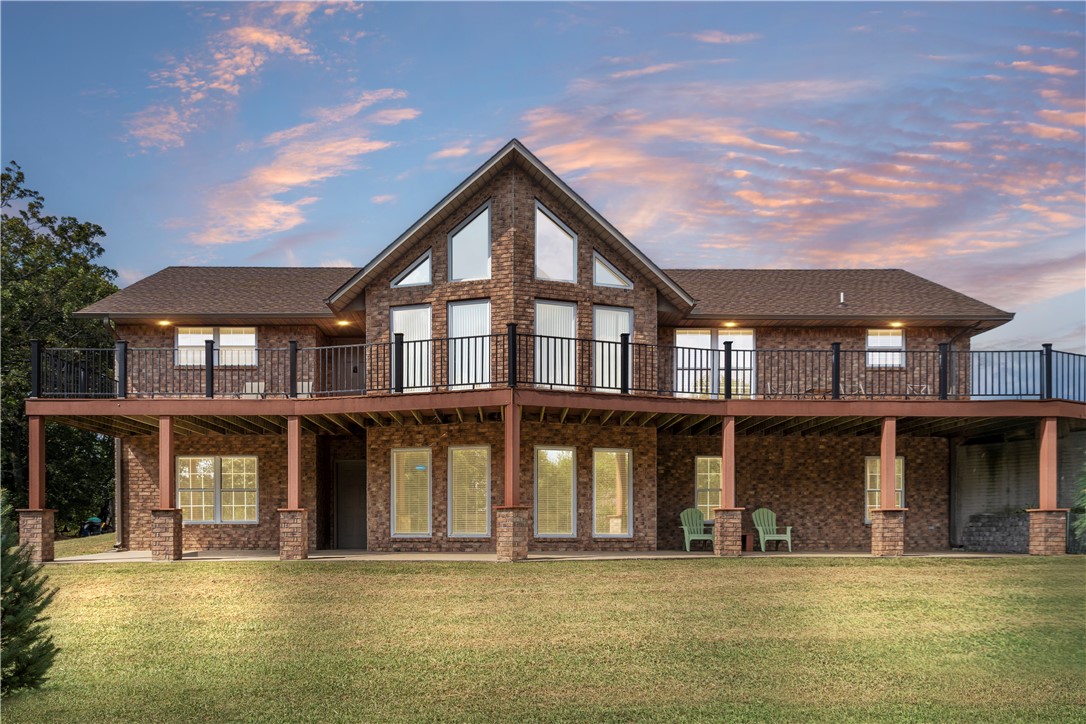 Have you been searching for the perfect place to spread out and call your own? This stunning 27 ± acre mini ranch delivers it all! Nearly 4,000 sq ft of custom living space is designed to impress at every turn. Inside, soaring cathedral ceilings and floor-to-ceiling windows flood the living room with natural light and showcase countryside views. The main level offers the primary suite plus an additional bedroom, while the lower level is its own retreatāfeaturing two more bedrooms, a game room, a second living area with fireplace, and a full kitchenette with island and dining space. Perfect for entertaining, multi-generational living, or hosting guests with ease.The 40x60 insulated shop is a true standout, with three garage doors, an office, full bath, and laundry. Whether you dream of a hobby farm, recreation, or the peace of country living, this property delivers. Bonus: the home next door is also available, offering a rare chance to live beside family, friends, or create your own multi-property estate.