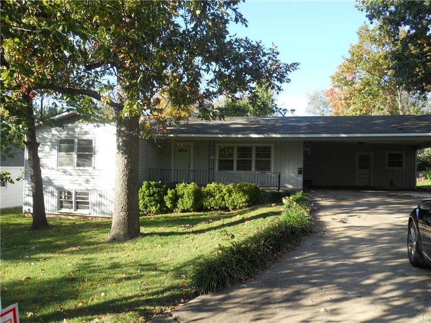 Spacious one-level home for lease in the historic district on a half-acre lot, close to Downtown Fayetteville and the University of Arkansas. This 4-bedroom, 2-bath property features all vinyl plank flooring with no carpet, a remodeled primary bath, granite kitchen countertops, and a large laundry room. Enjoy a generous backyard with mature trees, a covered front porch, and a carport. New blinds are being installed, and lawn care is provided at the owner’s expense. Pets must be approved; non-smokers only. Agent owned.