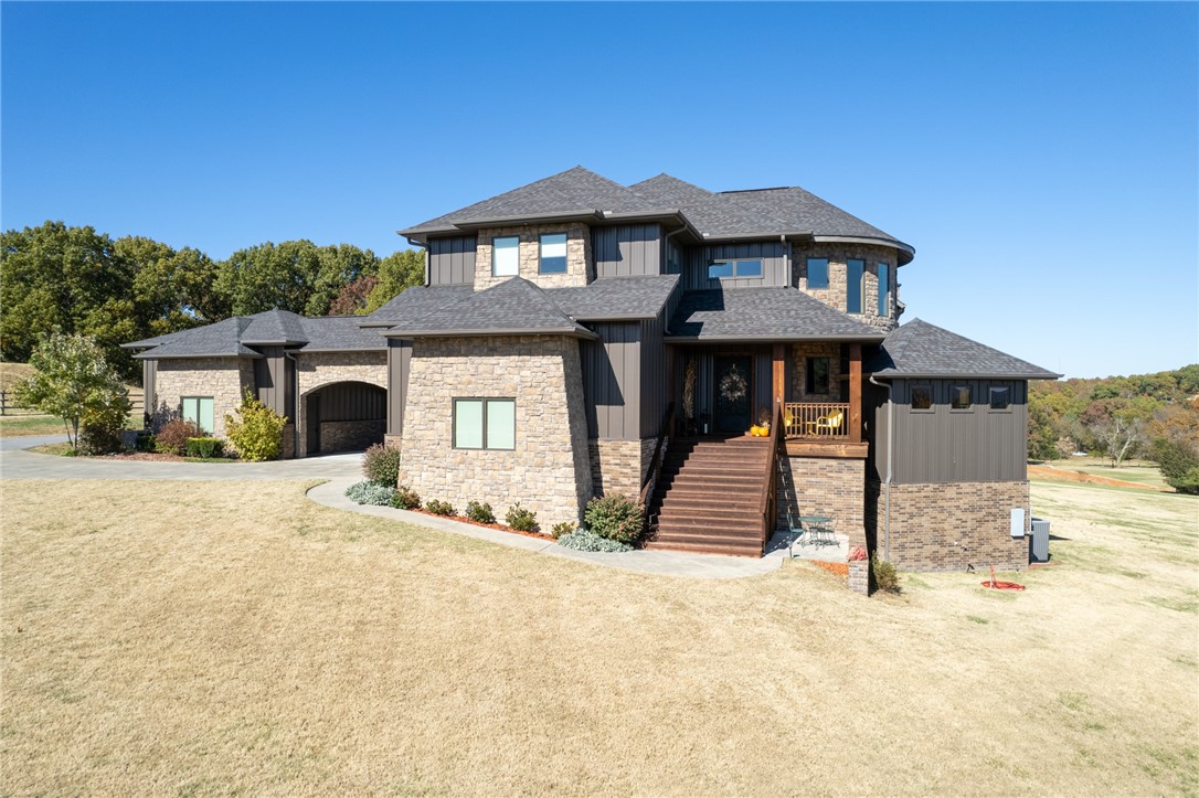 Located behind a private gated entry, this meticulously custom built home boasts panoramic views of natural beauty with an Outdoor Oasis. The outdoor space is an entertainers dream with nearly 2,000 sq ft of patios & cedar decks! Guests can swim in the sparkling saltwater pool or cuddle up to a fire by the Outdoor Fireplace or the Firepit! Inside light pours thru the windows enhancing every room including the Chef's Kitchen beating as the heart of this home with professional series appliances! An open floor plan offers a family room w/floor to ceiling stone fireplace, dining area, wet bar with ice maker, screened in patio, mudroom w/pet shower & 2 powder rooms all on the main floor. The basement renders a safe room, media room w/projector, game area, partial kitchen, bonus room & MIL Suite. Follow the exquisite winding staircase up to a Primary Suite & luxurious bath on the upper floor, 2 bedrooms, 3rd bedroom w/built ins used as a current art/craft room & full guest bath! Ready to call this one home? Call today!