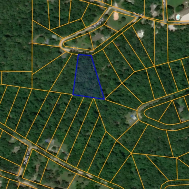 Dream lot near lake and marina. This beautiful wooded lot where Single-Family Mobile Homes are welcome. You can walk to the lake from the community trail. The Rocky Branch Marina and State Park are less than a mile away, the lot size and tax are approximate. Seller financing available