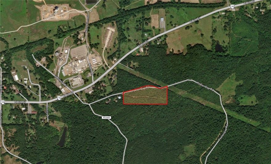 This 11.58-acre tract inside the city limits of Danville offers a rare combination of scale, access, and setting for residential development. A dedicated road already runs east–west through the property, providing the framework for a future subdivision layout. The land rises gradually from west to east, creating elevated homesites with long views over the city while still being only minutes from schools, services, and employers.

Bordered by Ouachita National Forest to the south and city-owned property to the east, the tract benefits from permanent green space and natural buffers that enhance long-term value for estate-style lots. With Wayne-Sanderson Farms’ new $43 million feed mill less than a mile away and a growing need for housing tied to the area’s largest employers, the location supports both immediate development and longer-term investment. At $11,000 per acre, this property represents a strong entry point into a market positioned for steady residential growth.