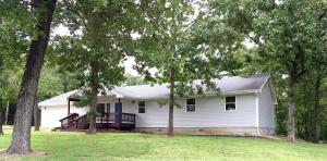 NEWLY REMODELED HOME WITH OPEN FLOOR PLAN, LAMINATE FLOORING THROUGH-OUT. NEW DOORS, PAINT, CABINETS, GUTTERS, NEW STAINLESS STEEL SAMSUNG APPLIANCES WITH WARRANTY, 4 BEDROOMS, 2 FULL BATHS, JACUZZI WHIRLPOOL TUB, LARGE PARK-LIKE LAWN, PARTIAL LAKE VIEW, 2 NICE DECKS, WELL, SIDEWALKS, CONCRETE DRIVE & 2 CAR OVERSIZED GARAGE. GARDEN AREA, AND UNIQUE WATERFEATURE IN BACK. MOVE IN READY