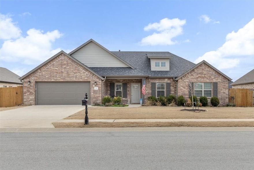 Just the right size at just the right price! This one is located in the middle of NWA, sitting in a charming neighborhood in Tontitown, a town known for its annual Grape Festival, Winery & some of the best Italian food you shouldn’t miss. Tontitown is a growing community that offers a unique blend of local activities, delicious food & family-friendly events. Designed with an open kitchen area & steps away from the screened-in porch makes hosting family & friends even better. Don’t forget the enormous yard for that game of frisbee with the dog. This setup is ideal for gatherings, as well as giving everyone privacy inside with a split floor plan. The convenience of a fridge, washer & dryer, built in cabinets, extra flooring added in the attic for storage & a storage building out back make it the best use of space. A few streets away, you’ll find a playground & community pool. A new roof for peace of mind & solar panels for savings, this home has the perfect blend of comfort, community & convenience for anyone.