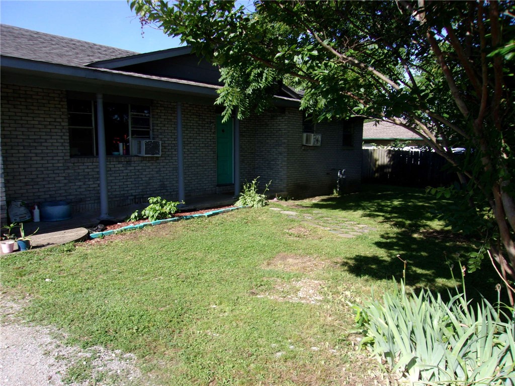 Large home with 4 bedroom and 1 1/2 bath. Has big back yard with 441 sqft. hobby room or shop. Yard has privacy fence all around. Home has new dishwasher and Electric panel has been upgraded. The refrigerator and washer do convey with property. The a/c window units do convey also. Home is great first time home Buyer. Security camaras do not convey. Home is priced to upgrade. Home is AS-IS. No repairs