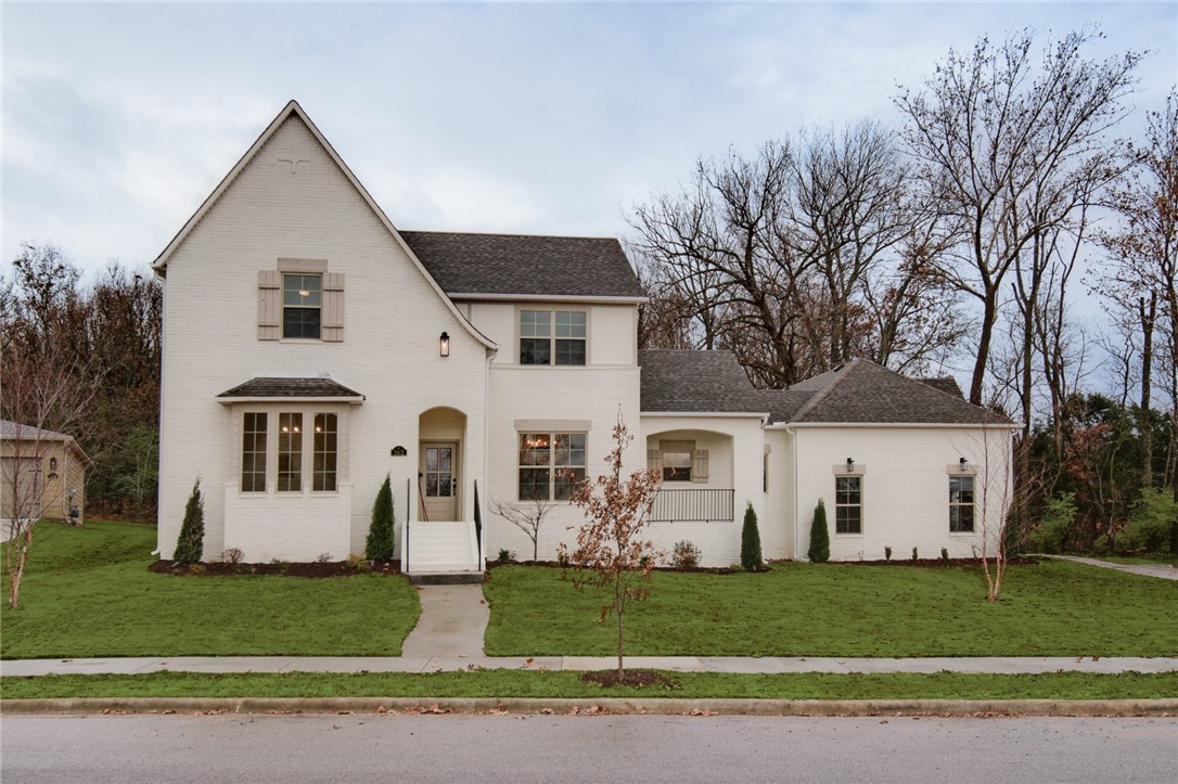 You will love this spacious, painted brick home with old world charm in the Brooklands neighborhood BACKING UP TO GREENSPACE! 5 bedrooms, 3 bathrooms, plus a game/media room provide ample room for all to enjoy. This beautiful home offers a 3-car garage and a staircase to LARGE, UNFINISHED STORAGE SPACE that could have multiple uses. 2 covered porches, a dining room with built in cabinets and floating shelves, a free standing tub, and washer dryer connections both up and downstairs are just a few of the extras this home has to offer. The beautiful Brooklands community offers a community pool and playground to enjoy.