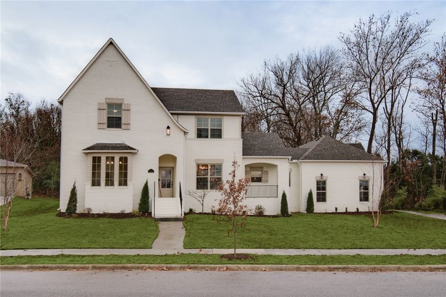 You will love this spacious, painted brick home with old world charm in the Brooklands neighborhood BACKING UP TO GREENSPACE! 5 bedrooms, 3 bathrooms, plus a game/media room provide ample room for all to enjoy. This beautiful home offers a 3-car garage and a staircase to LARGE, UNFINISHED STORAGE SPACE that could have multiple uses. 2 covered porches, a dining room with built in cabinets and floating shelves, a free standing tub, and washer dryer connections both up and downstairs are just a few of the extras this home has to offer. The beautiful Brooklands community offers a community pool and playground to enjoy.