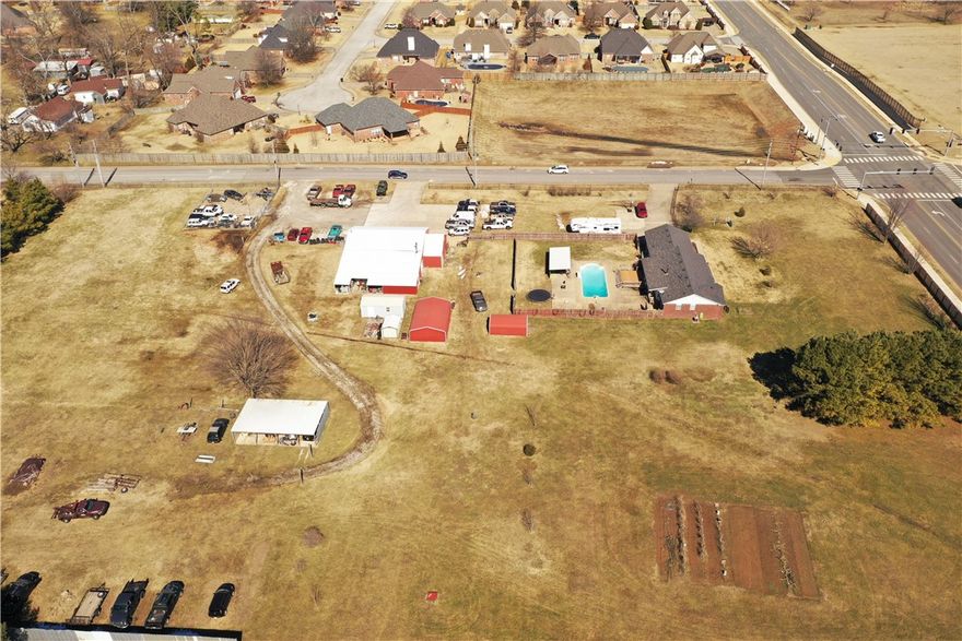 Development opportunity exists on this prime location, level land, with great access to West and Belview.  The possibility for re-zone to multi-family is already in the Rogers Growth Plan. With 6-12 units per acre possible with commission approval. Seller currently operates a business on the property and a ranch home   The potential is limitless.
- please make an appointment to show through Showingtime listing agent.