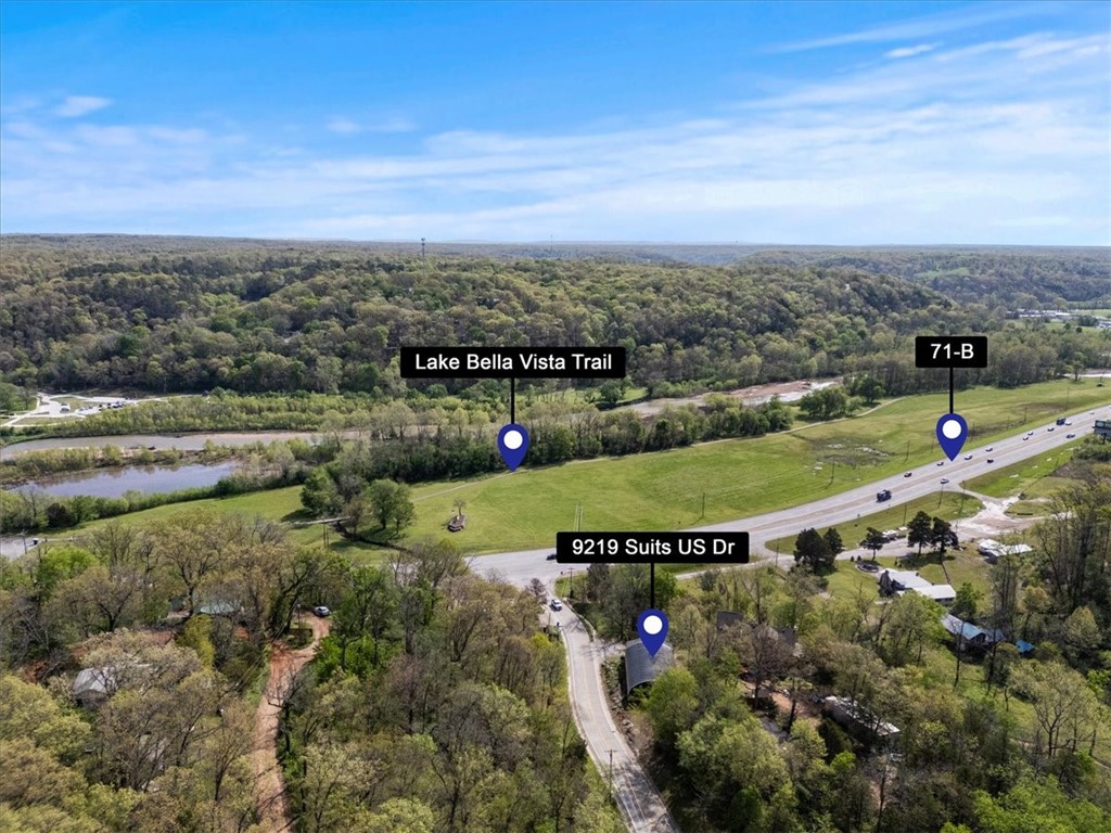 Development opportunity for Townhomes surrounded by bike trails such as Sick A More, Down Under Loop, and Lake Bella Vista Trail. Currently in a residential area of few homes. There is a steel building located on the property that can be removed or converted into housing for rental or sale.
Situated just across highway 71 from Bella Vista Trail, close to Interstate 49, and Town Center.
Property for sale includes three parcels, 16-00279-000, 16-00280-000, 16-00281-000.