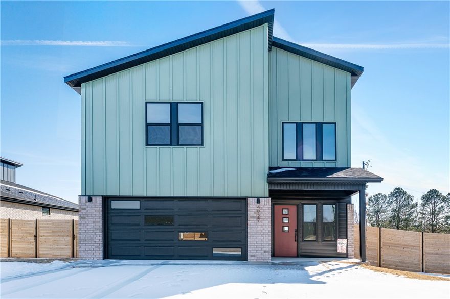 Step into this Contemporary two-story home featuring three bedrooms and two-and-a-half baths with a smart, open main-level layout. The main level features a spacious living room that flows seamlessly into the dining area and kitchen, ideal for shared meals, weekend gatherings and everyday moments. Both the range and water heater are wired and plumbed for either electric or gas, offering flexibility to suit personal preferences. All bedrooms are conveniently located on the second floor, providing privacy and a quiet retreat away from the main living areas, with comfortable room sizes and a well-balanced layout suited for a variety of lifestyles. Outdoors, a private backyard offers additional space to relax, entertain or enjoy peaceful evenings at home. A convenient Electric Vehicle (EV) charger is included in the garage. Conveniently located near shopping, dining, schools, parks and major commuter routes, this residence blends comfort, flow and location in a setting designed for easy living.